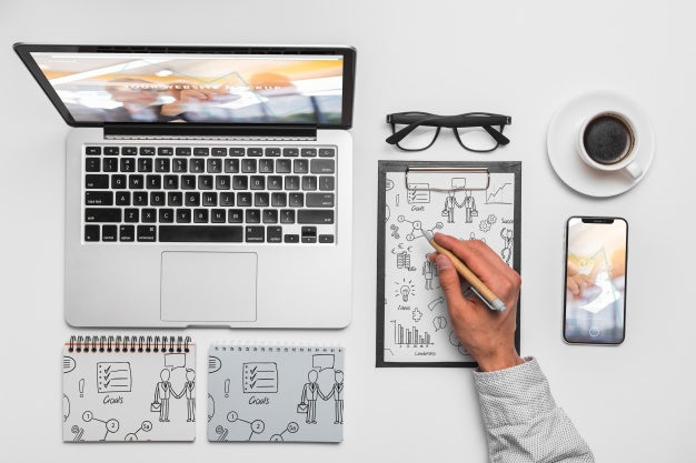 Top View Composition With Laptop And Office Supplies Psd