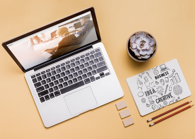 Top View Composition With Laptop And Office Supplies Psd