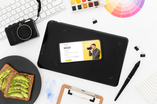 Top View Desk With Phone Mock-Up And Avocado Toast Psd