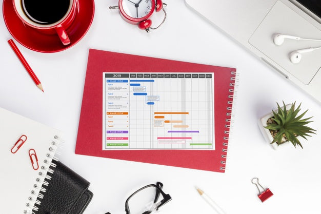 Top View Desktop Concept With Schedule Psd
