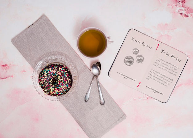 Top View Donut And Tea Arrangement Psd