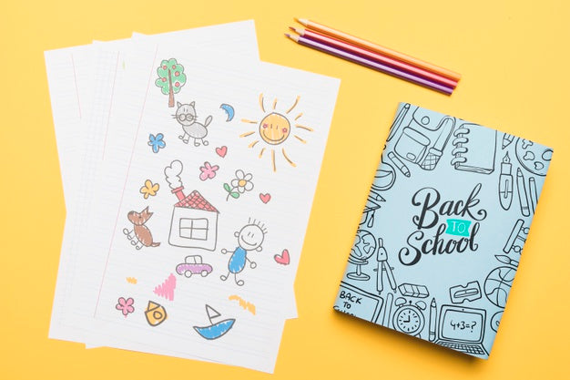 Top View Drawings On Paper With Yellow Background Psd