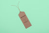 Top View Eco Tag On Green Background Psd