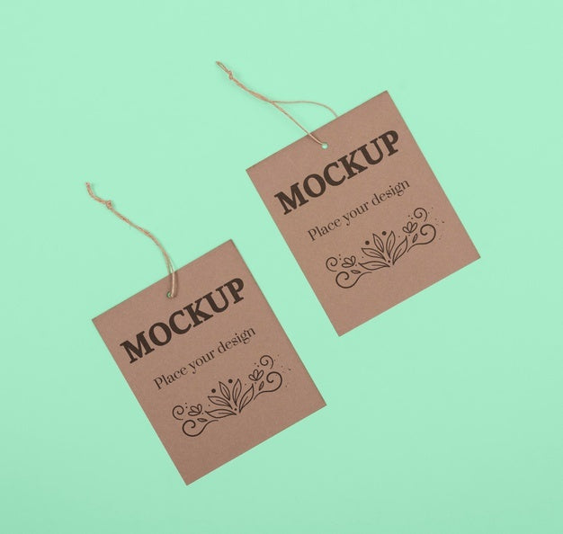 Top View Eco Tags On Green Background Psd