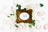 Top View Elegant Frame Surrounded By Petals Psd