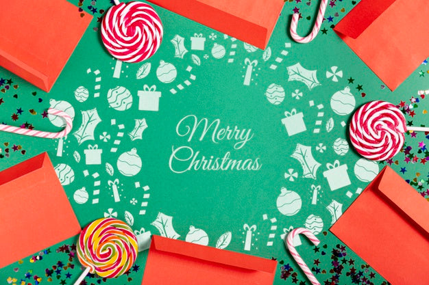 Top View Envelope Frame And Sugar Lollipops Psd