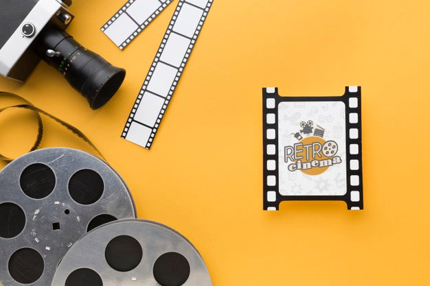 Top View Film Disks And Old Camera Psd