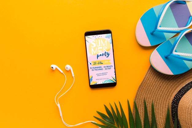 Top View Flip Flops With Mobile Phone And Earphones Psd