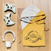 Top View Folded Hoodie Mock-Up With Controllers And Headphones Psd