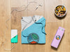 Top View Folded Hoodie Mock-Up With Phone Case, Bottle And Snack Psd
