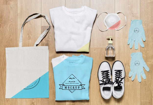 Top View Folded Hoodies Mock-Up With Bag And Shoes Psd