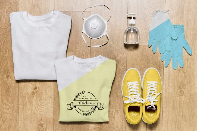 Top View Folded Hoodies Mock-Up With Mask And Gloves Psd