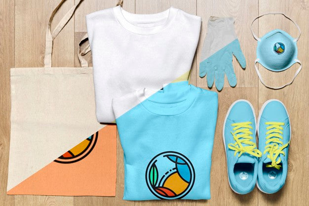 Top View Folded Hoodies Mock-Up With Shoes And Bag Psd