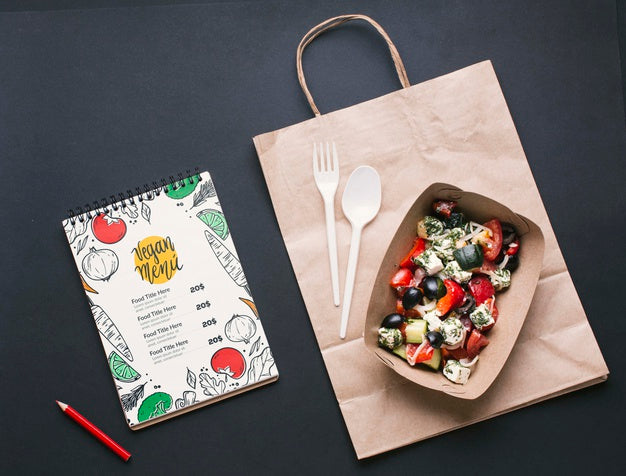 Top View Food Service Arrangement With Notepad Mock-Up Psd