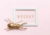 Top View Golden Bug On White Frame Psd