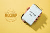 Top View Hand Holding Notebook Psd