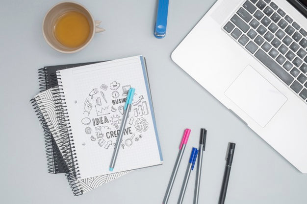 Top View Laptop With Colorful Pens Psd