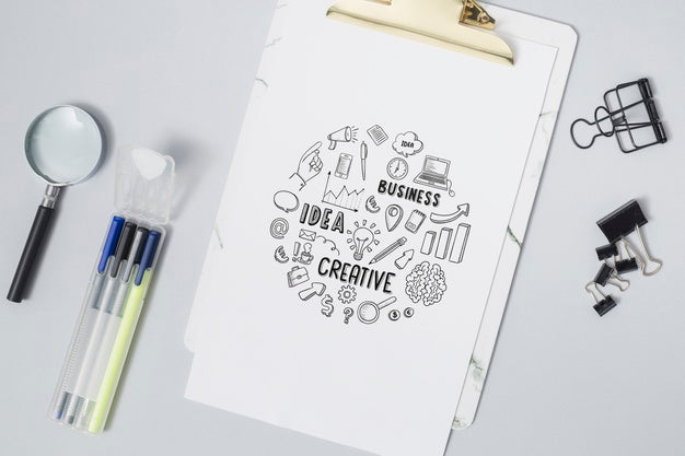 Top View Magnifying Glass With Pens Psd