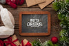 Top View Merry Christmas Chalkboard And Christmas Pine Leaves Psd