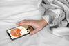 Top View Mobile On Bed Psd