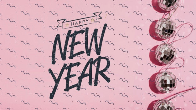 Top View New Year Lettering With Little Disco Balls Ornaments Psd