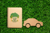 Top View Notebook Mock-Up And Paper Car Psd