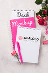 Top View Notebook Mock-Up And Roses Psd