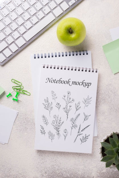 Top View Notebook Mock-Up And Stationery Near Apple And Keyboard Psd