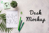 Top View Notebook Mock-Up And Stationery Near Plant Psd