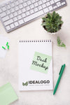 Top View Notebook Mock-Up And Stationery Near Succulent Plant And Keyboard Psd