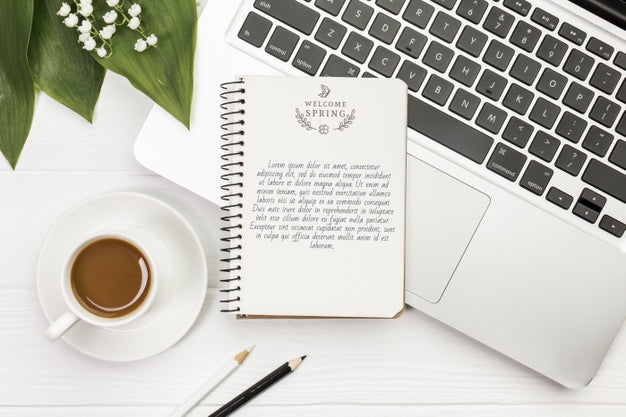 Top View Notebook On Top Of Laptop Concept Psd