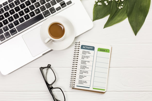 Top View Notebook With Activity And Weekly Planner Psd