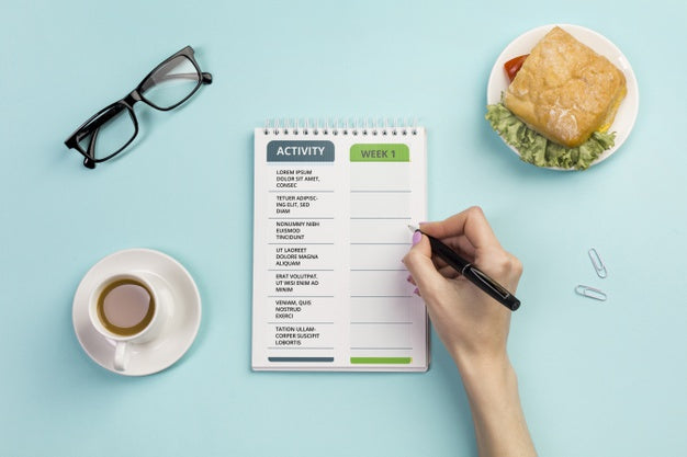 Top View Notebook With Daily Tasks And Coffee Psd