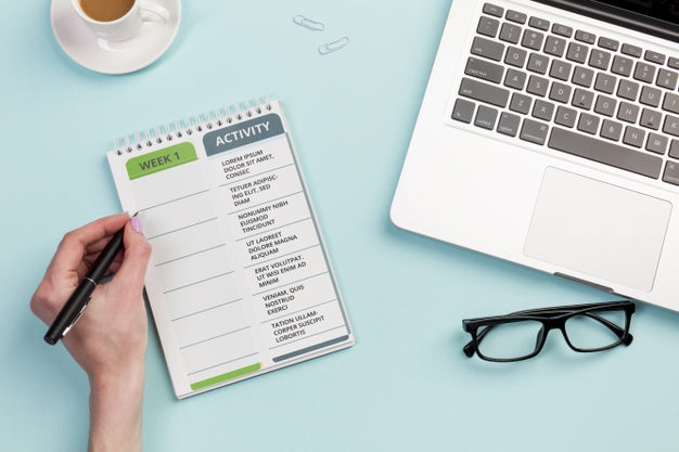 Top View Notebook With Daily Tasks To Check Psd