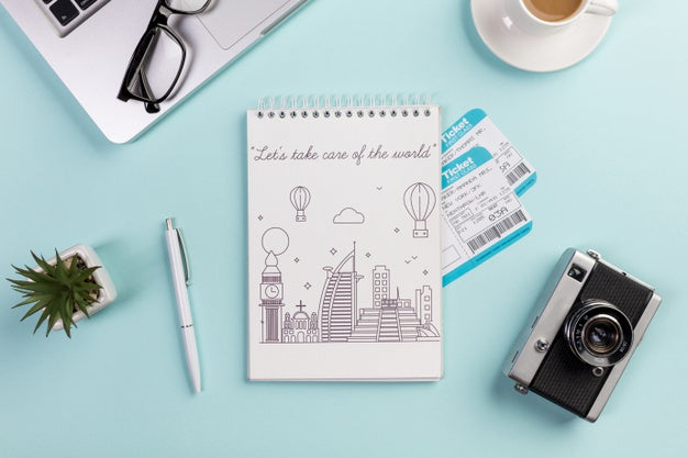 Top View Notebook With Flight Tickets And Camera Psd