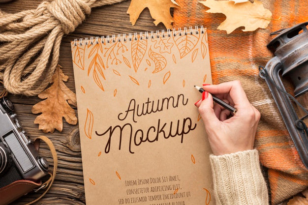 Top View Notebook With Rope, Camera And Lantern Psd