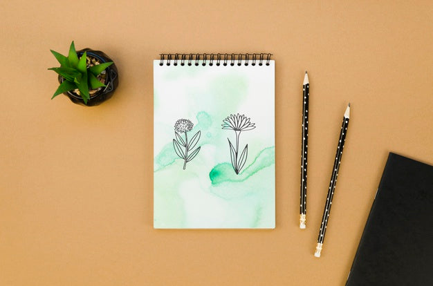 Top View Notepad Mock-Up On Brown Background Psd