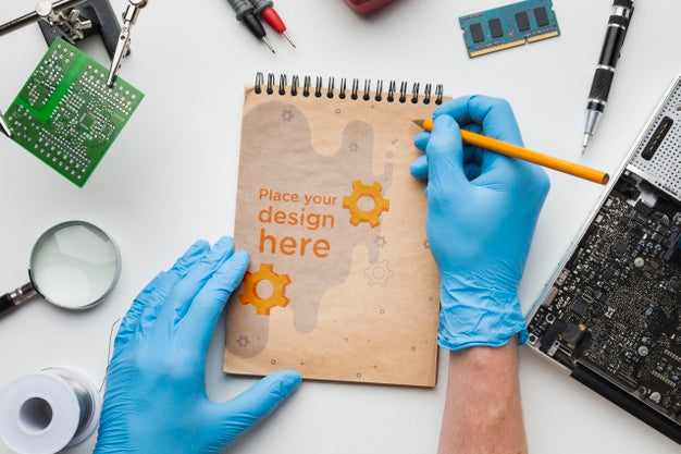 Top View Notepad With Electronics Tools Psd