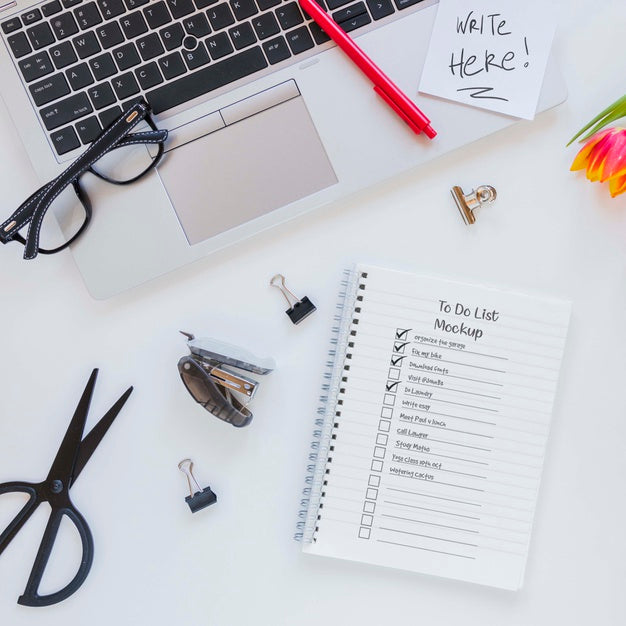 Top View Notepad With Notes On The Desk Psd