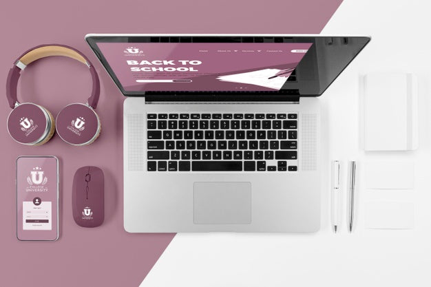 Top View Of Back To School Laptop With Headphones And Mouse Psd