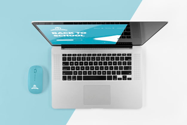 Top View Of Back To School Laptop With Mouse Psd