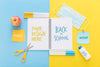Top View Of Back To School Notebook With Scissors And Medical Mask Psd