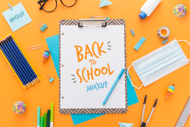 Top View Of Back To School Notepad With Pencils And Essentials Psd