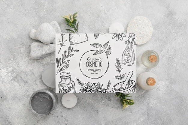 Top View Of Beauty Spa Essentials With Stones And Leaves Psd