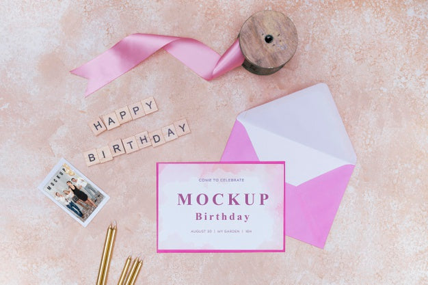 Top View Of Birthday Envelope With Ribbon And Card Psd