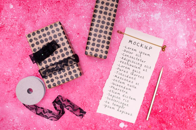 Top View Of Birthday Gift With Ribbon And Card Psd