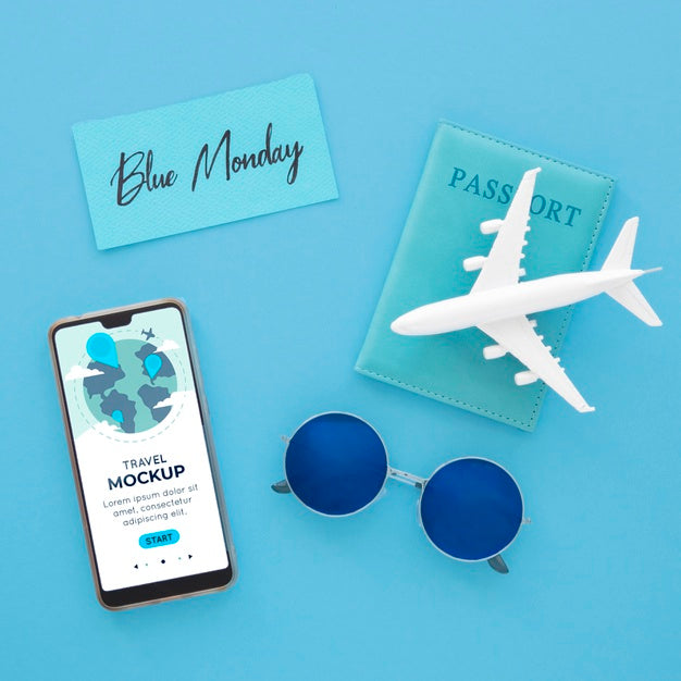 Top View Of Blue Monday Airplane With Smartphone And Sunglasses Psd
