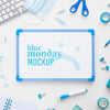 Top View Of Blue Monday Whiteboard With Scissors And Stationery Psd