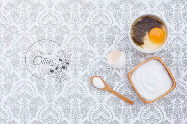 Top View Of Body Butter And Egg On Plain Background Mock-Up Psd