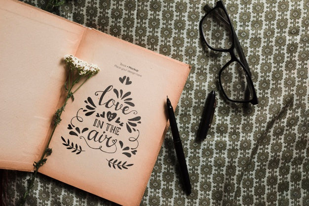 Top View Of Book With Glasses And Pen Psd